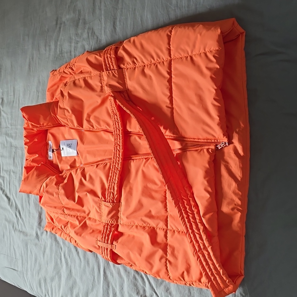 Puffer vest sleevless with a stand-up collar, size M, orange